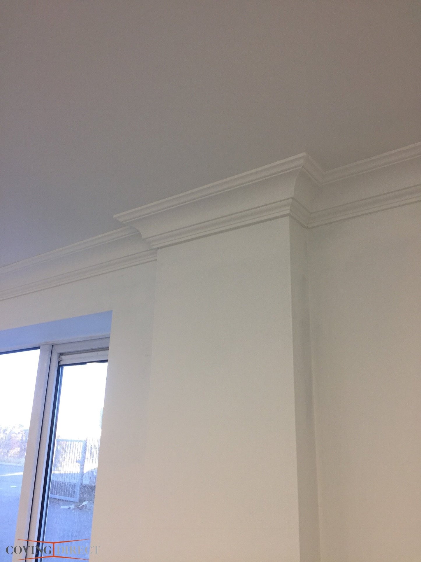 Crown - Classic Coving installed in a room with a light colour scheme
