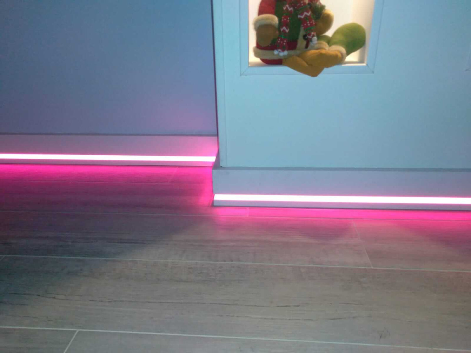 QL040P - Skirting Board lit up in purple