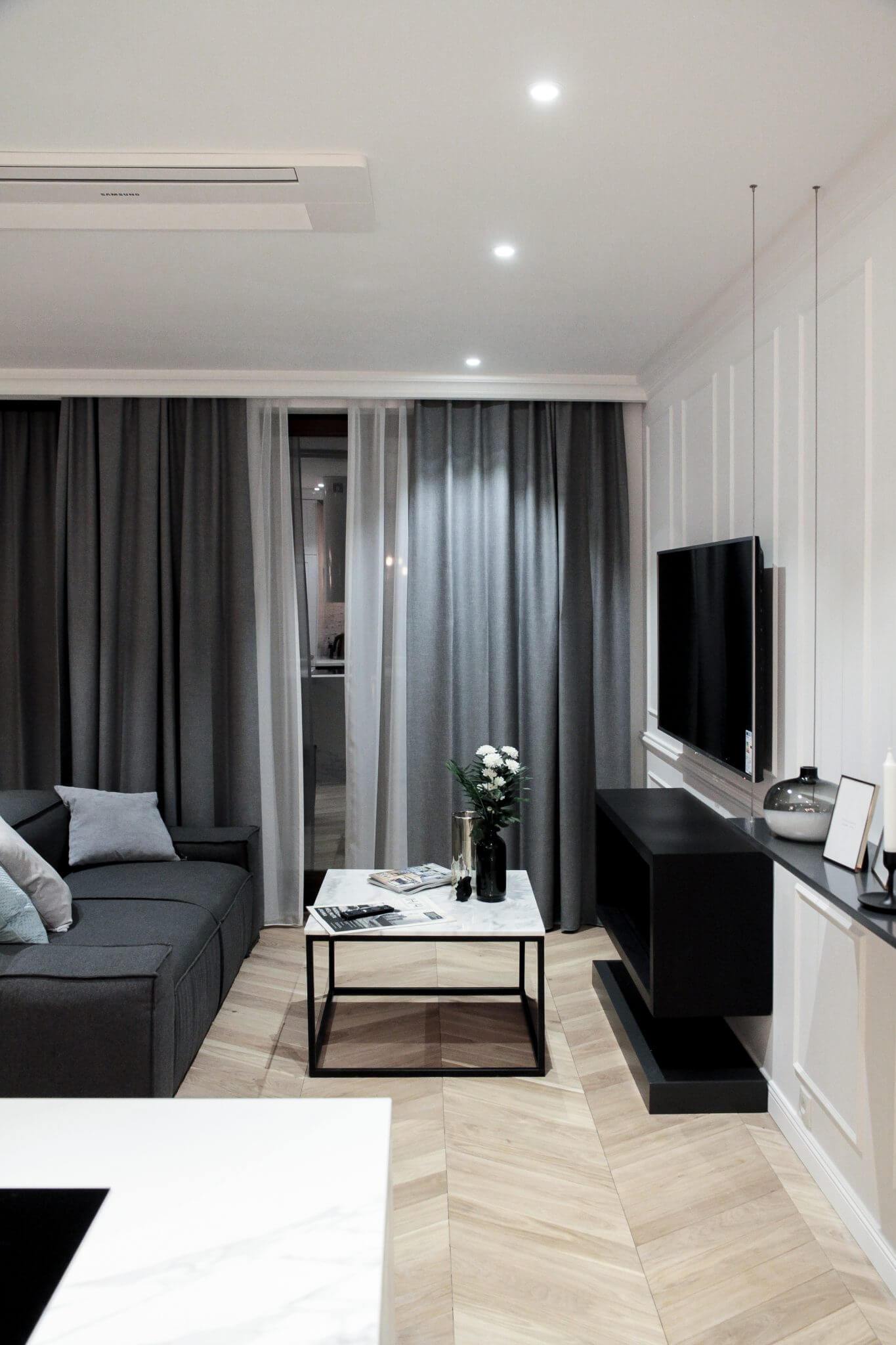 QL026 - Curtain Profile in a room with a dark colour scheme